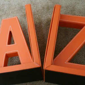 A - Z Bookends Book Books Orange Vinyl Faux Leather 8" Tall White Stitch Detail